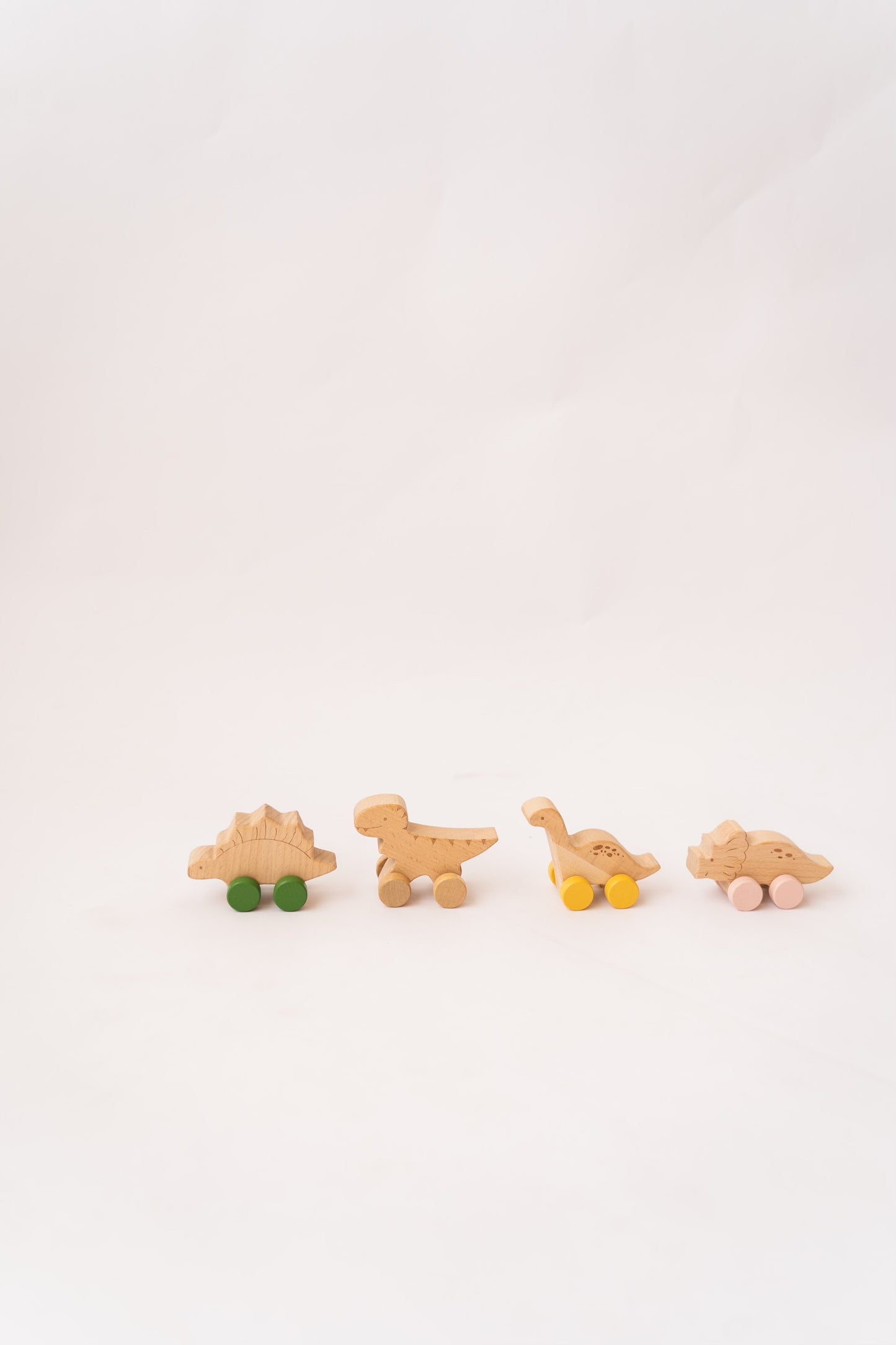 Wooden Dinosaurs on Wheels
